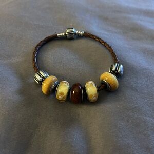 Pandora leather bracelet with wood and murano glass beads and stoppers